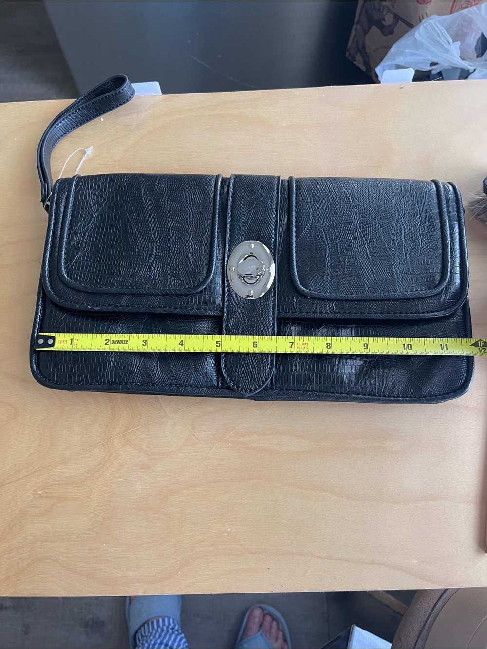 Cosmopolitan Black Leather Wristlet with Turn-Lock Accent